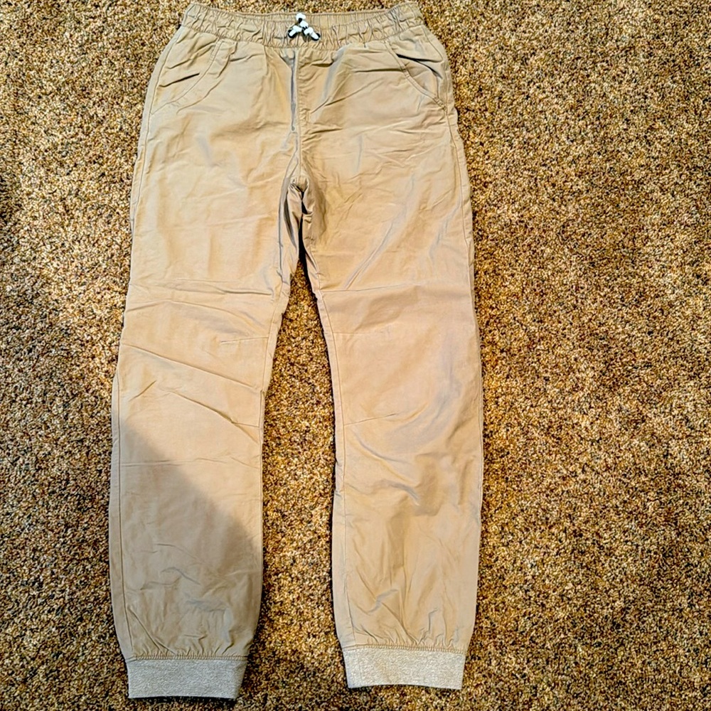 Warm lined Cat and Jack size 16 boys joggers in tan color.  Great condition!